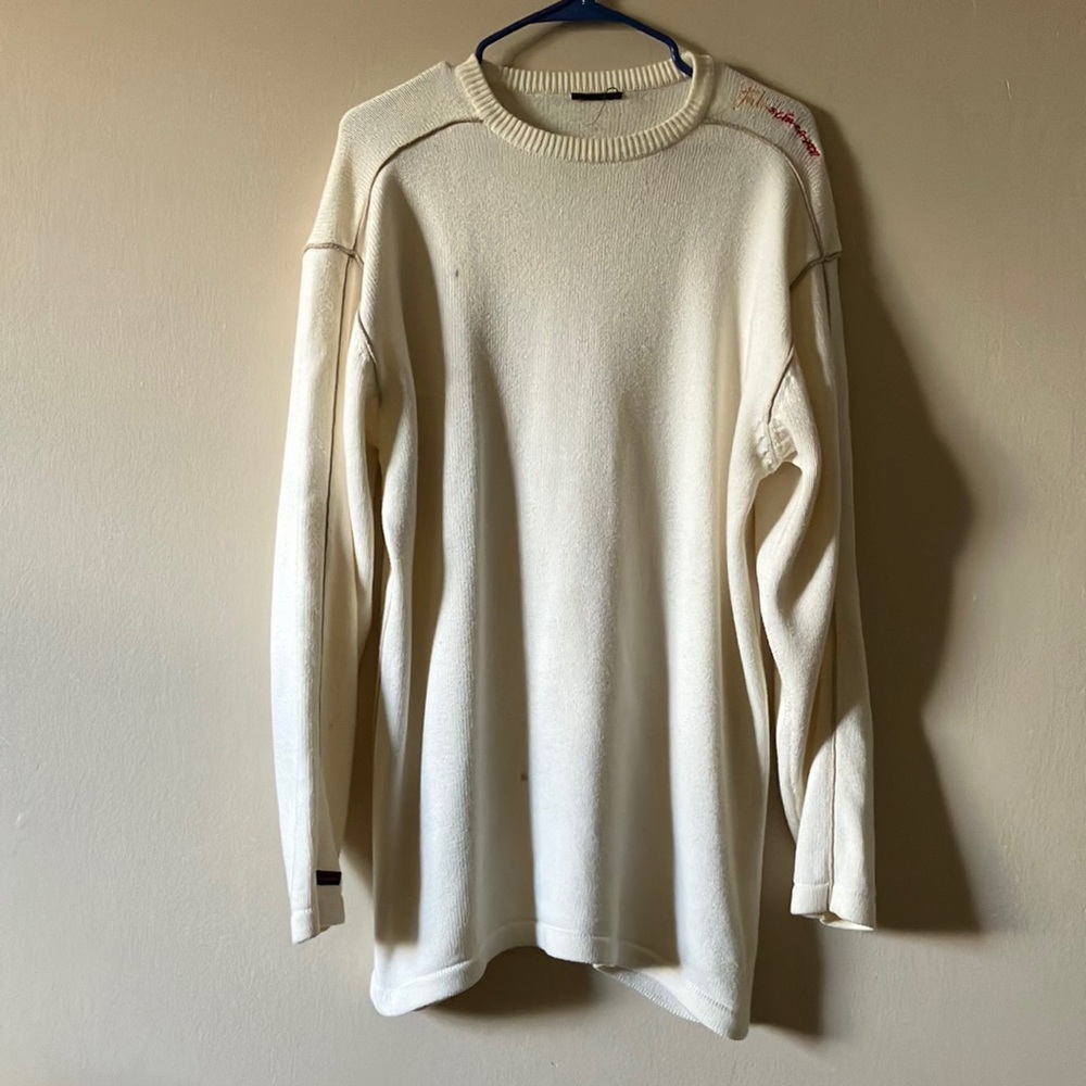 I’m selling a fubu sweater color is cream crewneck size L long sleeves